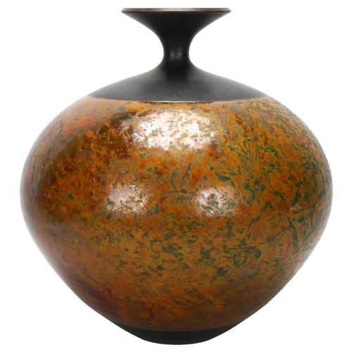 413 - Andrew Hill, a large raku vase, the mottled orange glazed bulbous form with black everted neck, with... 