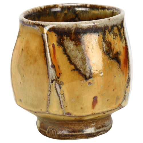 471 - Micki Schloessingk, a studio pottery yunomi / tea bowl, makers mark to base, height 9cm