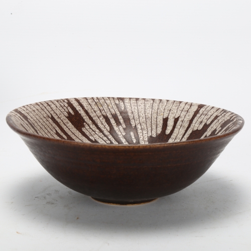 476 - Carolyn Genders, a studio pottery bowl, makers mark to base, diameter 19.5cm