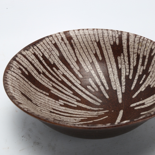 476 - Carolyn Genders, a studio pottery bowl, makers mark to base, diameter 19.5cm