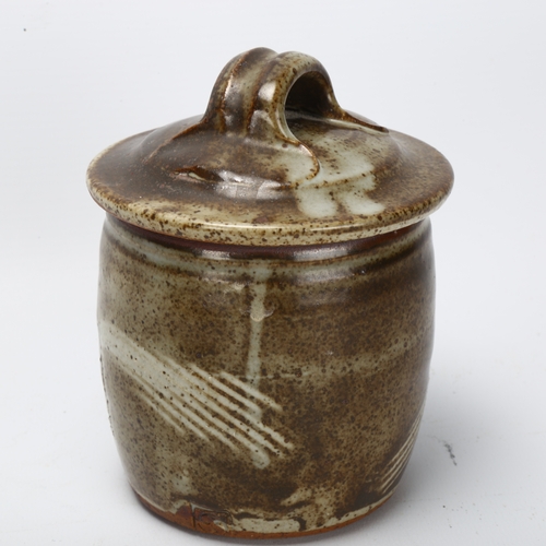 477 - Mike Dodd, a square section tenmoku glaze plate and an early storage jar, makers mark to indistinct ... 