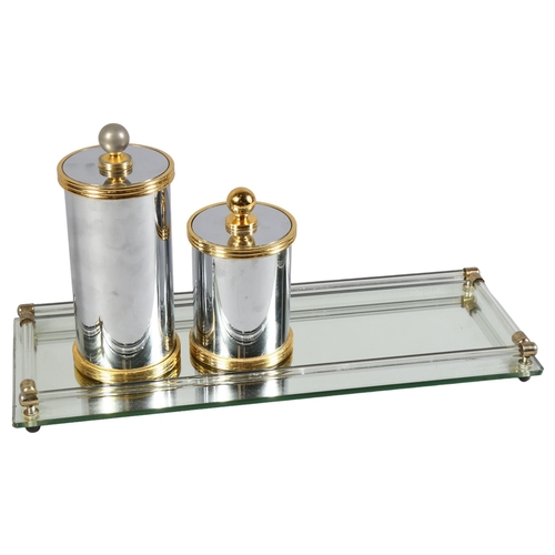 405 - A Hollywood Regency style, mirror glass tray, with mirrored metal cannisters, length 40cm