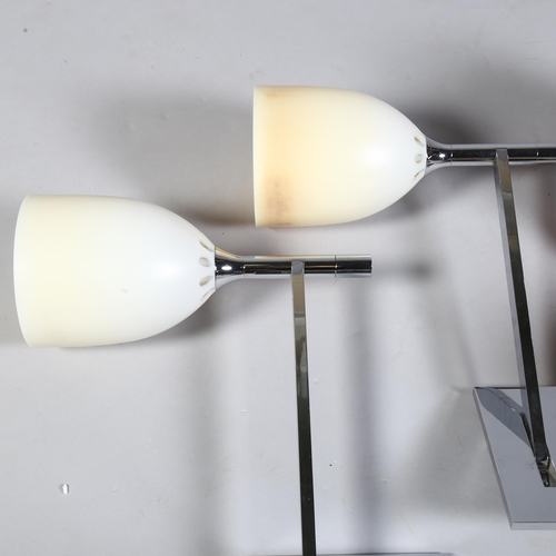 422 - A pair of Philippe Starck designed KTribe wall light for Flos, polished aluminium fittings and bronz... 