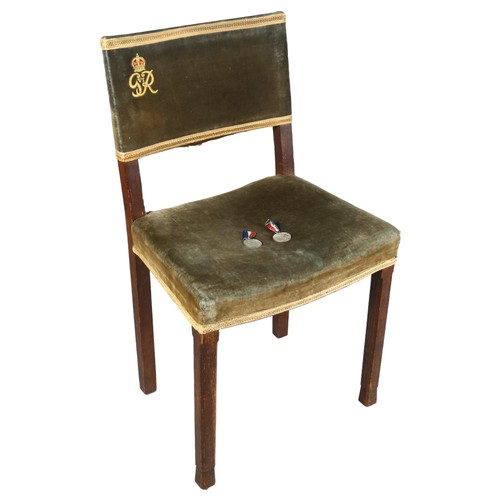 251 - A King George VI limed oak Coronation chair, by W Hands & Sons Ltd, dated 1937, green velour upholst... 