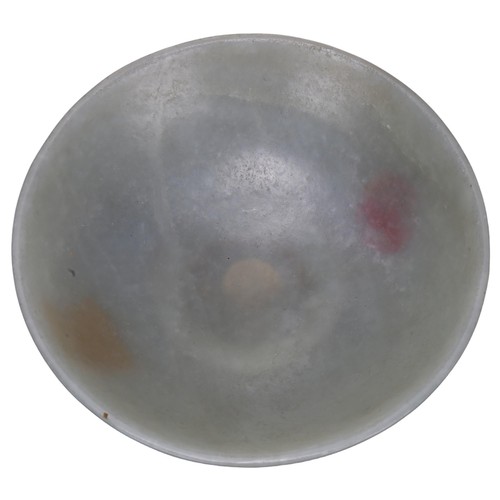 178 - A Chinese jade carved footed bowl, with paint seal to underside, diameter 10cm