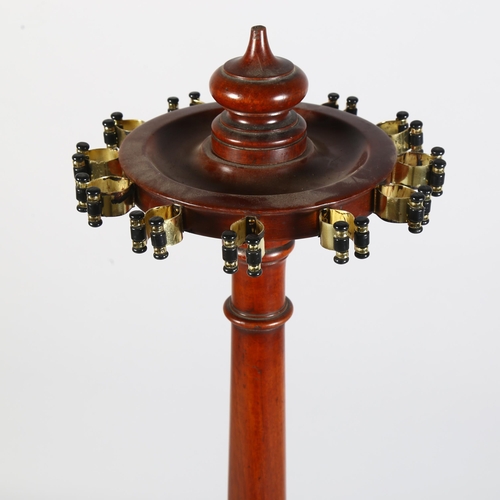 228 - A Victorian mahogany cue stand, fitted to hold 12 cues, raised on 3 carved paw feet, height 112cm