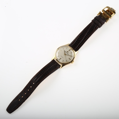 1000 - JAEGER LECOULTRE - a 9ct gold automatic wristwatch, ref. 33321, circa 1960s, silvered dial with gilt... 