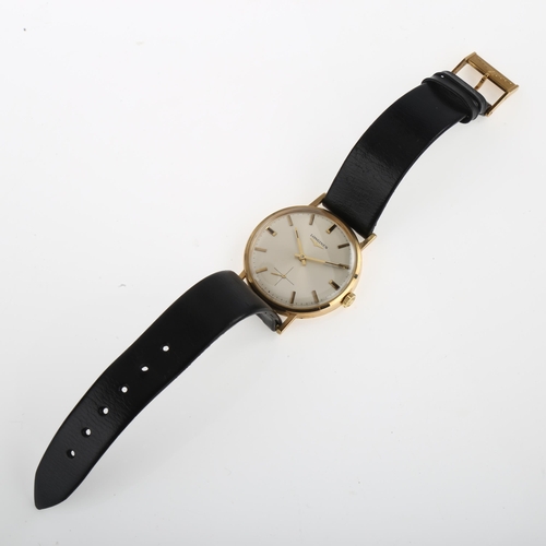 1012 - LONGINES - a 9ct gold mechanical wristwatch circa 1972, silvered dial with gilt baton hour markers a... 