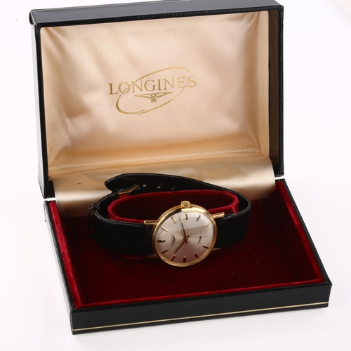 1012 - LONGINES - a 9ct gold mechanical wristwatch circa 1972, silvered dial with gilt baton hour markers a... 