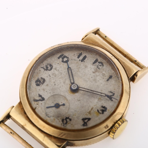 1019 - A mid-20th century 9ct gold wristwatch head, silvered dial with hand painted Arabic numerals, blued ... 