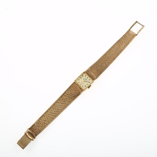 1031 - ROTARY - a lady's 9ct gold mechanical bracelet watch, circa 1970, gilded textured dial with baton ho... 