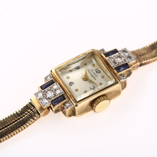 1033 - GIRARD-PERREGAUX - a lady's 9ct gold sapphire and diamond mechanical cocktail bracelet watch, circa ... 