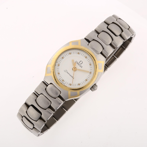 1034 - OMEGA - a lady's gold plated stainless steel Seamaster quartz bracelet watch, cream dial with dot ho... 