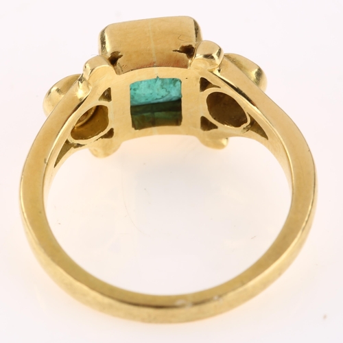 1125 - An 18ct gold emerald and diamond dress ring, set with emerald-cut emerald and modern round brilliant... 