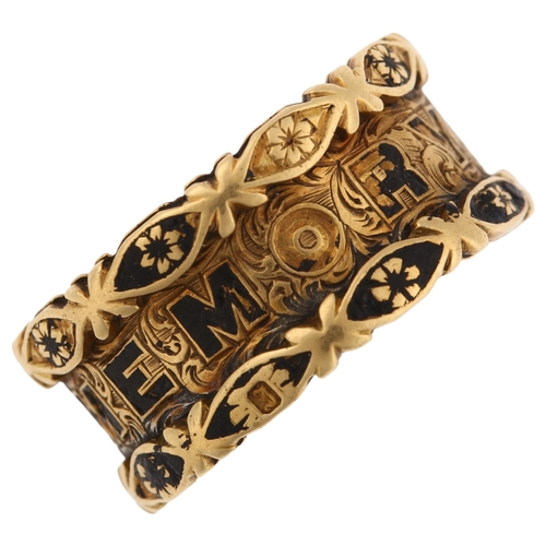 1130 - A Victorian 18ct gold and black enamel 'in memory of' memorial band ring, with allover foliate engra... 