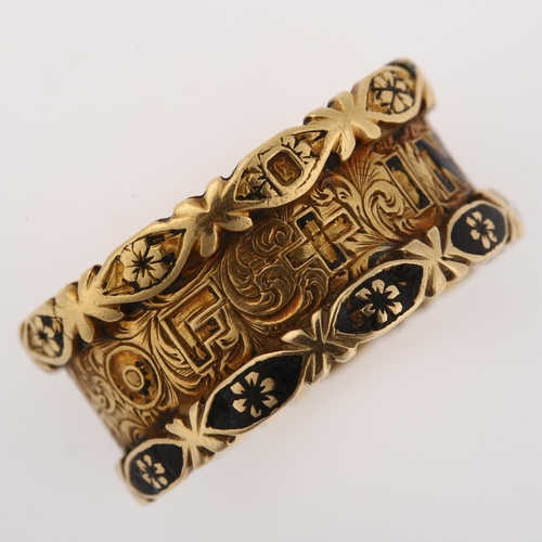 1130 - A Victorian 18ct gold and black enamel 'in memory of' memorial band ring, with allover foliate engra... 