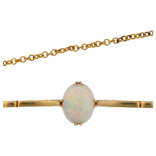 1132 - A 15ct gold opal bar brooch, set with oval cabochon opal, opal measures: 8.28 x 6.80 x 4.75mm, brooc... 