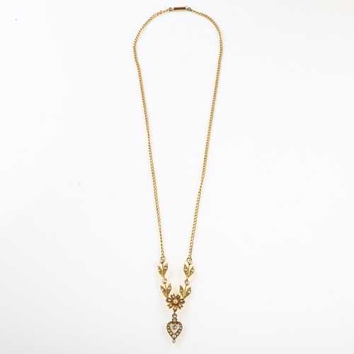 1137 - A Victorian split pearl and diamond drop pendant necklace, with flowerhead and openwork heart motif,... 