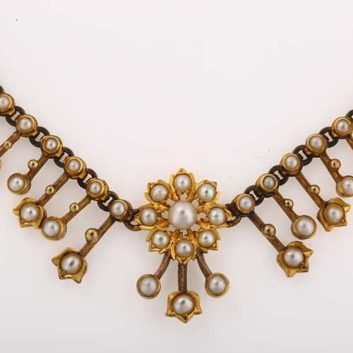 1138 - A Victorian split pearl graduated fringe necklace, with flowerhead and tulip motif, unmarked gold se... 