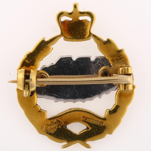 1146 - A British 9ct gold and enamel Royal Tank Regiment (RTR) badge brooch, with motto 