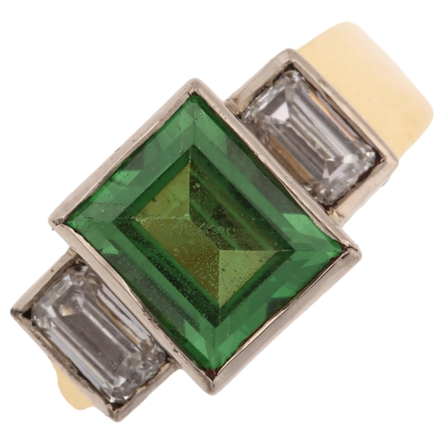 1147 - An 18ct gold three stone tsavorite garnet and diamond ring, set with rectangular step-cut green garn... 