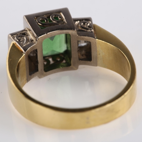 1147 - An 18ct gold three stone tsavorite garnet and diamond ring, set with rectangular step-cut green garn... 