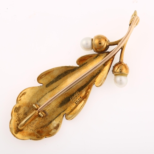 1148 - An early 20th century 18ct and 15ct gold and pearl acorn and oak leaf brooch, realistically modelled... 