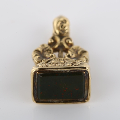 1282 - A 19th century miniature bloodstone seal fob, unmarked gold foliate mount, bloodstone length 8.2mm, ... 