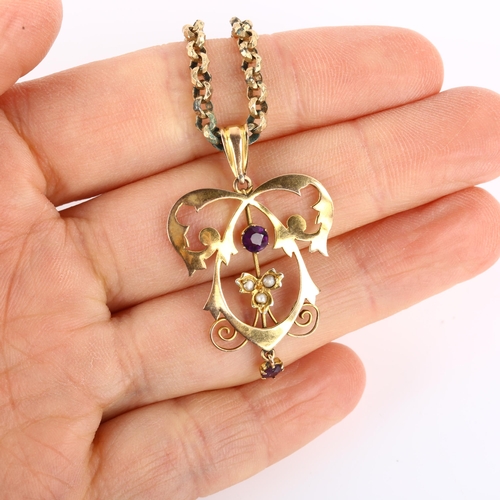 1285 - An Edwardian Art Nouveau 9ct gold amethyst and pearl openwork pendant necklace, on gold plated facet... 