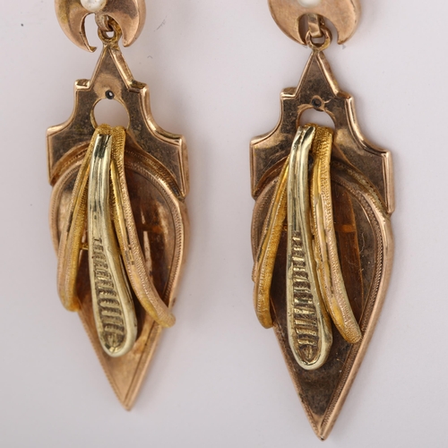 1152 - A pair of 19th century French two-colour gold drop earrings, with split pearl crescent moon shepherd... 