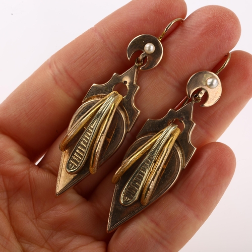 1152 - A pair of 19th century French two-colour gold drop earrings, with split pearl crescent moon shepherd... 