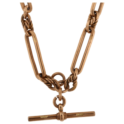 1158 - An Antique 9ct rose gold trombone and rope twist link Albert chain necklace, with 9ct T-bar and 2 do... 