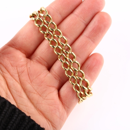1160 - An 18ct gold double curb link chain bracelet, with unmarked rose gold clasp, bracelet length 21cm, 4... 