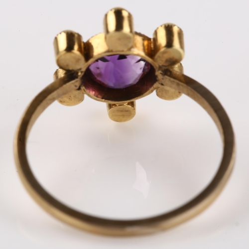 1165 - An Edwardian amethyst and split pearl dress ring, unmarked gold settings, setting height 13.4mm, siz... 