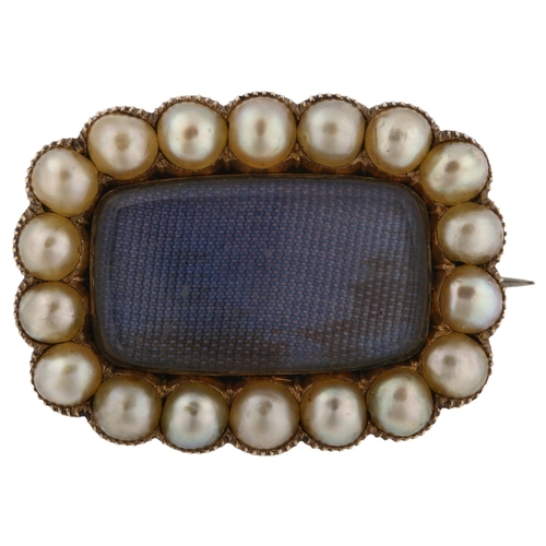 1175 - A Georgian split pearl mourning brooch, unmarked yellow metal closed-back settings with moire silk p... 