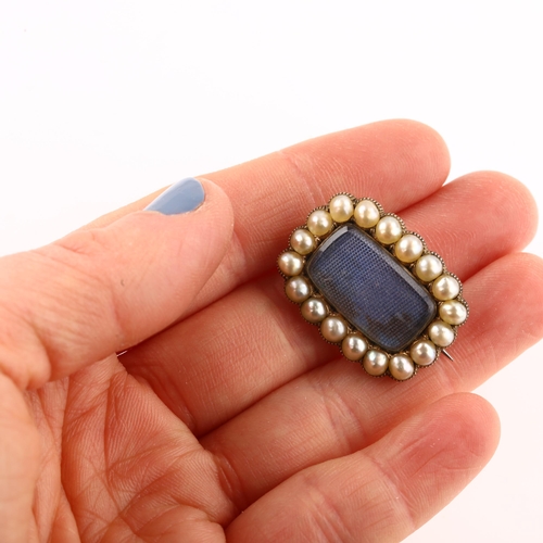 1175 - A Georgian split pearl mourning brooch, unmarked yellow metal closed-back settings with moire silk p... 