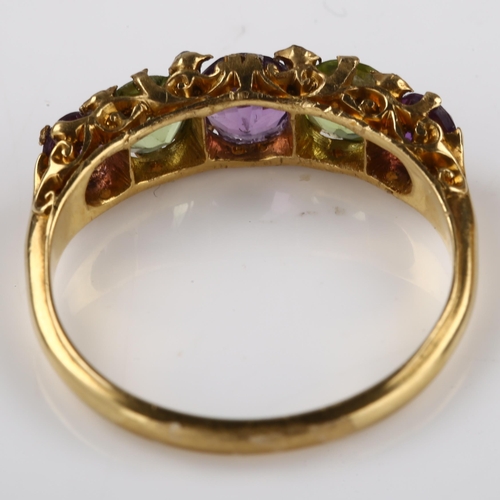 1181 - SUFFRAGETTE INTEREST - an early 20th century 18ct gold graduated five stone amethyst and peridot hal... 