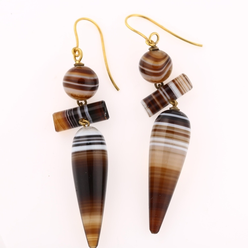 1182 - A pair of Victorian banded agate drop earrings with 9ct gold shepherd hook fittings, earring height ... 