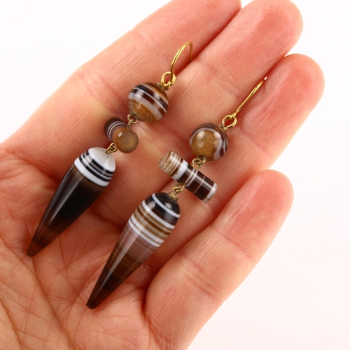 1182 - A pair of Victorian banded agate drop earrings with 9ct gold shepherd hook fittings, earring height ... 