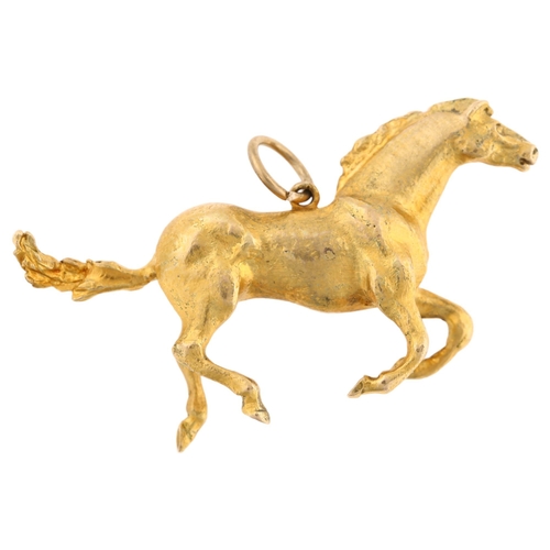 1190 - A late 20th century 9ct gold galloping horse pendant, realistically modelled, maker's marks TO'D, ha... 