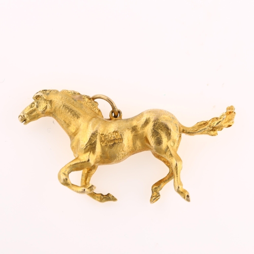 1190 - A late 20th century 9ct gold galloping horse pendant, realistically modelled, maker's marks TO'D, ha... 