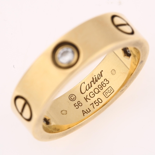 1196 - CARTIER - an 18ct gold diamond 'LOVE' band ring, with screw-head motif and modern round brilliant-cu... 