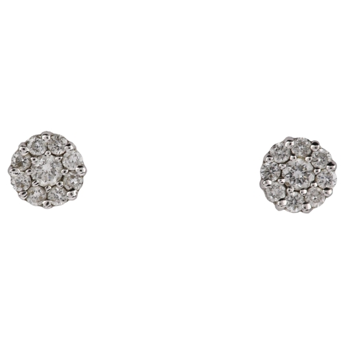 1221 - A pair of 18ct white gold diamond cluster earrings, set with modern round brilliant-cut diamonds and... 