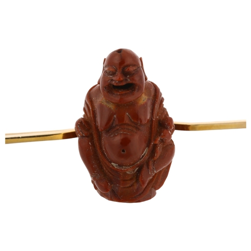 1226 - A Chinese carved olive nut Budai bar brooch, unmarked gold curved settings, brooch length 56.6mm, 5g