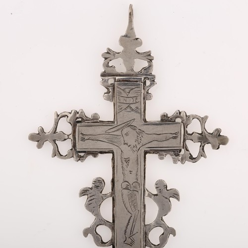 1203 - A 17th century reliquary silver cross pendant, engraved with Crucifixion of Christ beneath letter IN... 