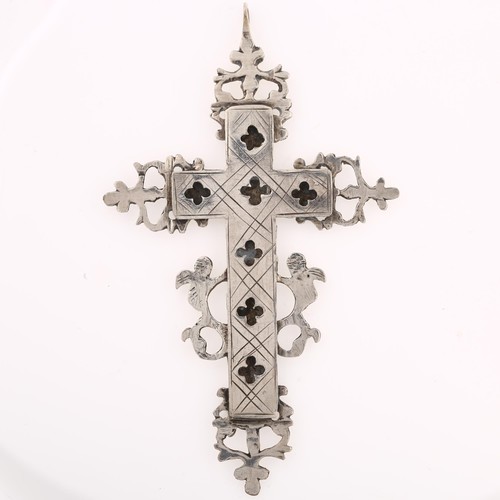 1203 - A 17th century reliquary silver cross pendant, engraved with Crucifixion of Christ beneath letter IN... 