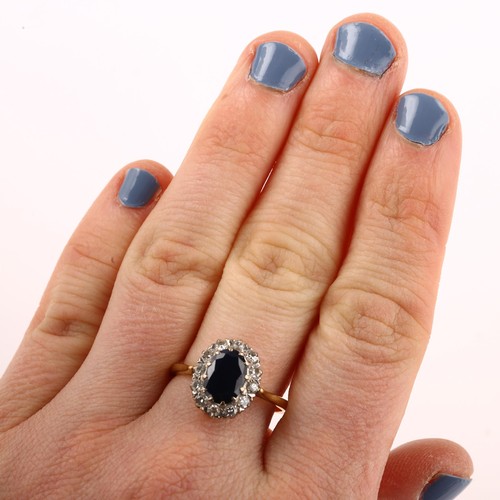 1206 - A mid-20th century 18ct gold sapphire and diamond cluster ring, set with oval mixed-cut sapphire and... 