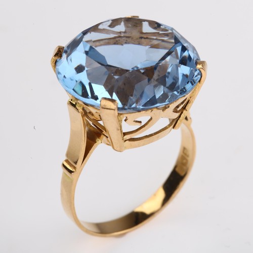 1207 - A large Middle Eastern blue synthetic spinel dress ring, pierced gold setting with large round-cut s... 