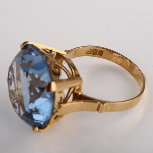 1207 - A large Middle Eastern blue synthetic spinel dress ring, pierced gold setting with large round-cut s... 