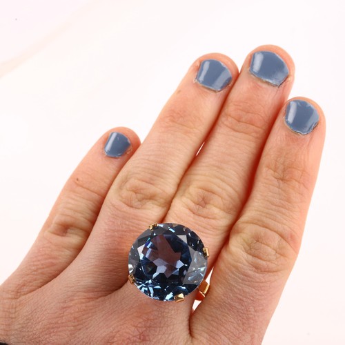 1207 - A large Middle Eastern blue synthetic spinel dress ring, pierced gold setting with large round-cut s... 